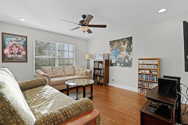 1741 Bonser Rd, Minneola, FL 34715 - living room with ceiling fan, wood finished floors, a textured ceiling, and recessed lighting
