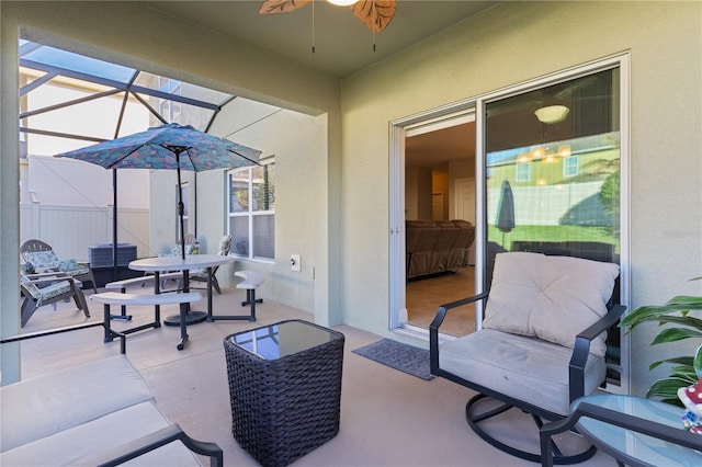 1741 Bonser Rd, Minneola, FL 34715 - view of patio featuring ceiling fan, a lanai, an outdoor living space, and outdoor dining space