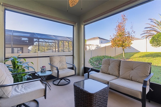 1741 Bonser Rd, Minneola, FL 34715 - sunroom with an outdoor hangout area, ceiling fan, and plenty of natural light