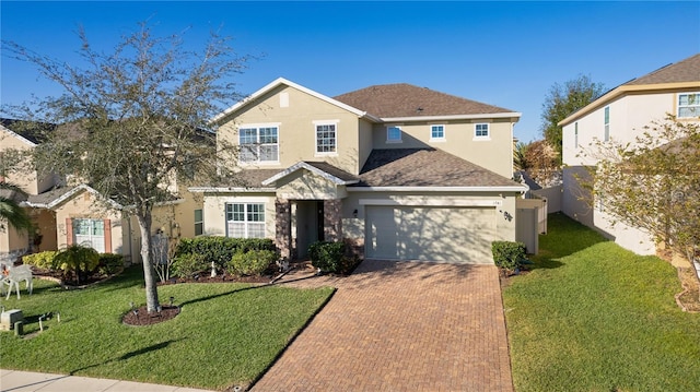 front of property with a front yard and a garage