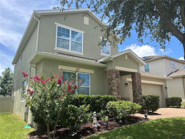 1741 Bonser Rd, Minneola, FL 34715 - view of front facade with stucco siding and stone siding