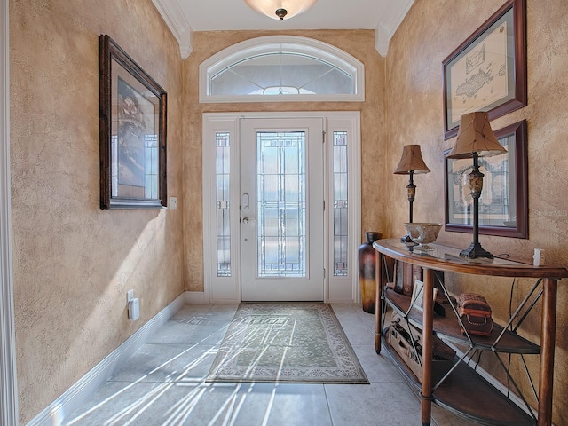 entrance foyer with a wealth of natural light, crown molding, and a high ceiling