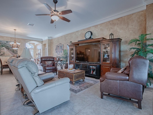 living room with crown molding, light tile patterned floors, and ceiling fan with notable chandelier