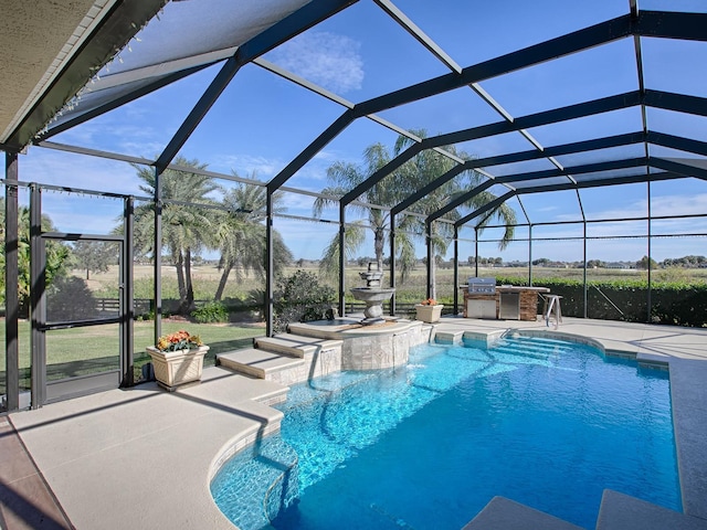 view of swimming pool featuring a lanai and a patio