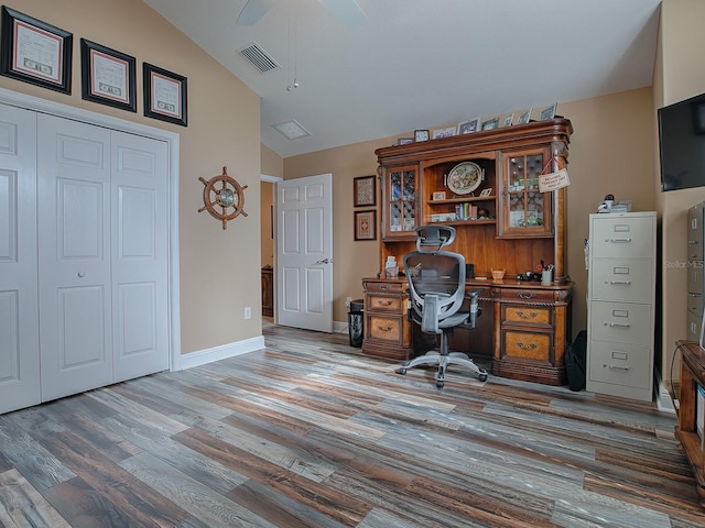 office with light hardwood / wood-style floors, ceiling fan, and lofted ceiling