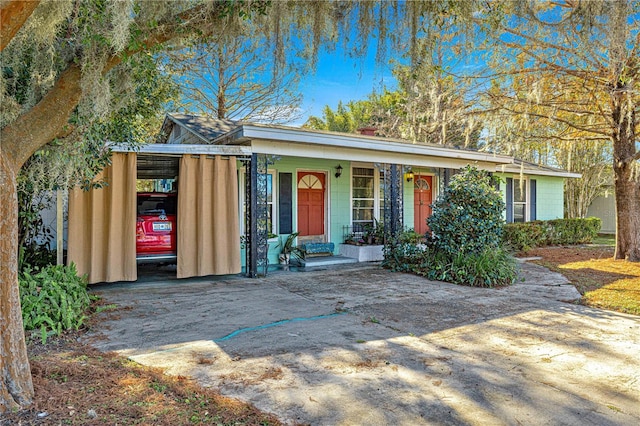 view of front of house featuring a carport