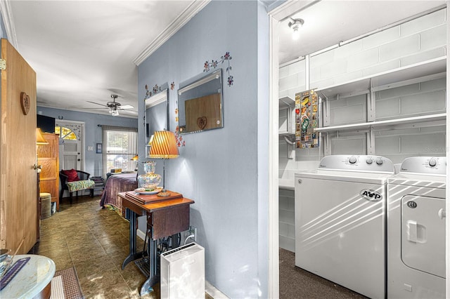 washroom featuring ceiling fan, ornamental molding, and washing machine and clothes dryer