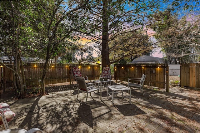 view of deck at dusk