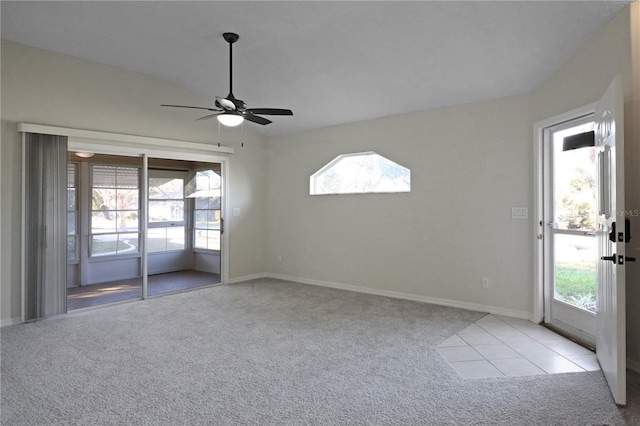 carpeted empty room featuring ceiling fan