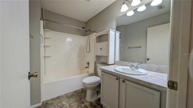 full bathroom with washtub / shower combination, vanity, toilet, and a textured ceiling