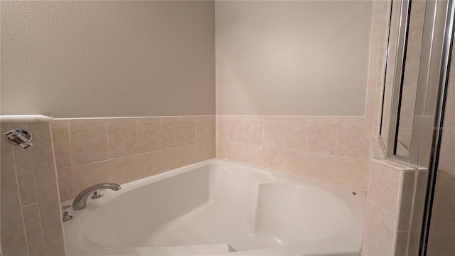 bathroom with a washtub