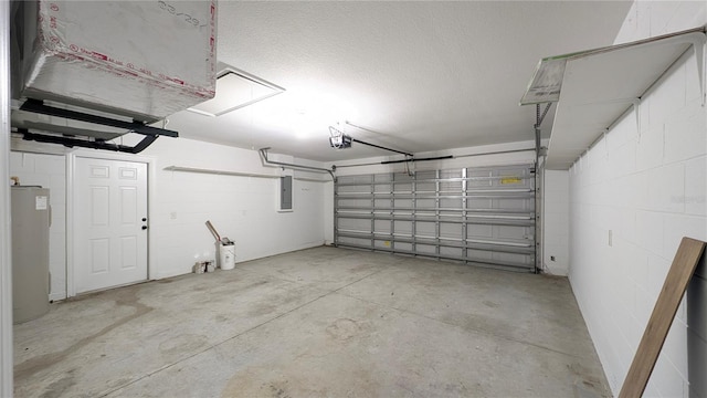 garage featuring a garage door opener, electric panel, and water heater