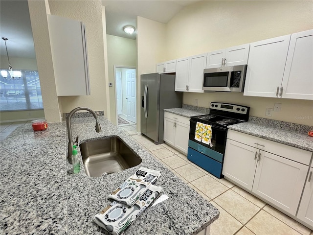 kitchen with white cabinets, sink, appliances with stainless steel finishes, light stone counters, and a chandelier