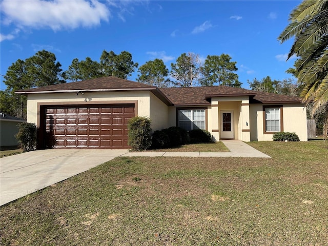 view of front of house with a garage and a front lawn