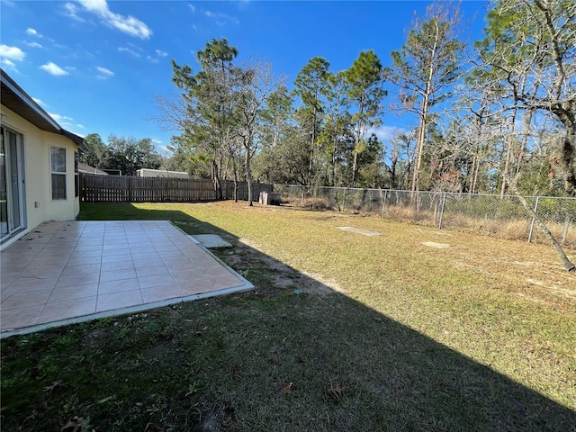 view of yard with a patio area