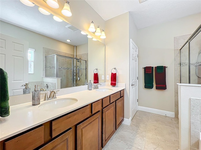 bathroom with vanity and walk in shower