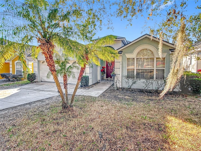 view of front of property with a garage