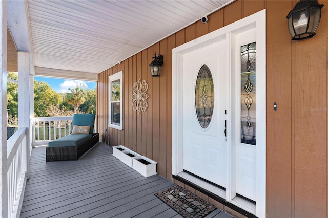 entrance to property featuring covered porch