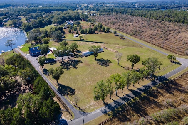 birds eye view of property with a rural view