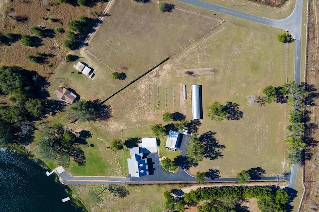 birds eye view of property featuring a rural view