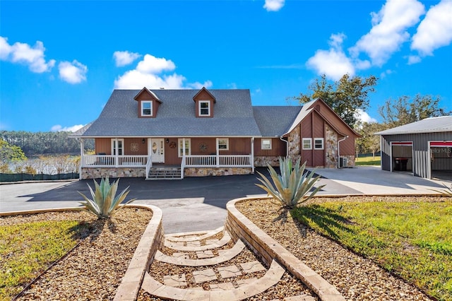 view of front of house with an outdoor structure