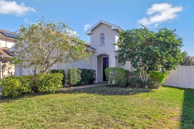 view of front of house with a front lawn