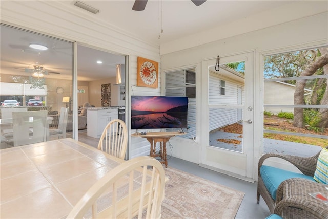 dining room featuring ceiling fan