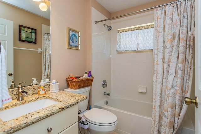 full bathroom featuring toilet, vanity, and shower / tub combo with curtain