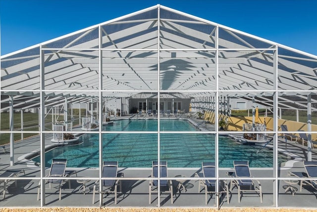 view of pool featuring a lanai