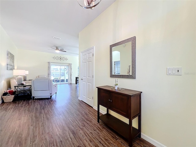 hall with dark hardwood / wood-style flooring