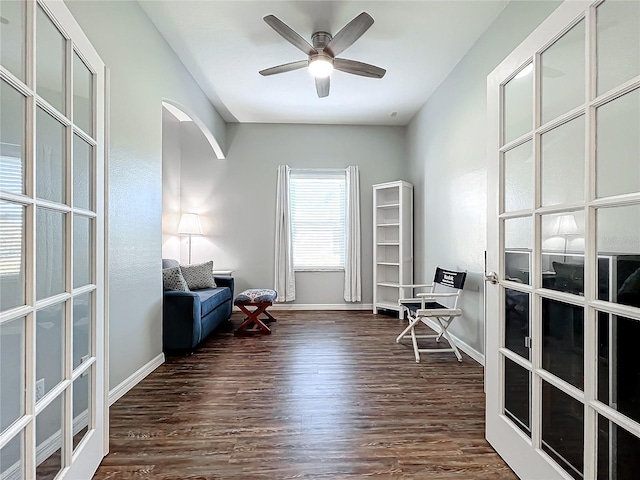 unfurnished room with ceiling fan, dark hardwood / wood-style flooring, and french doors