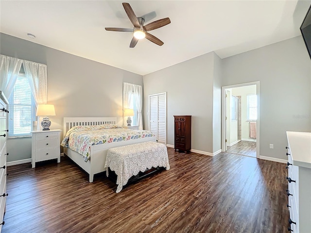 bedroom featuring ceiling fan, a closet, dark hardwood / wood-style flooring, and ensuite bath