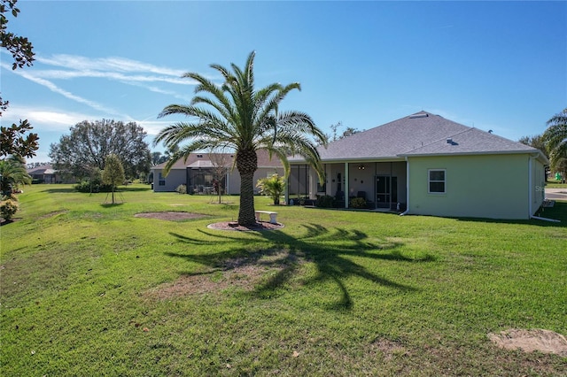 view of yard featuring a sunroom