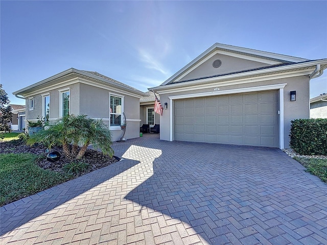 single story home with a garage