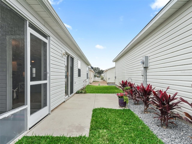 view of yard with a patio area