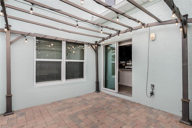 view of patio featuring a pergola