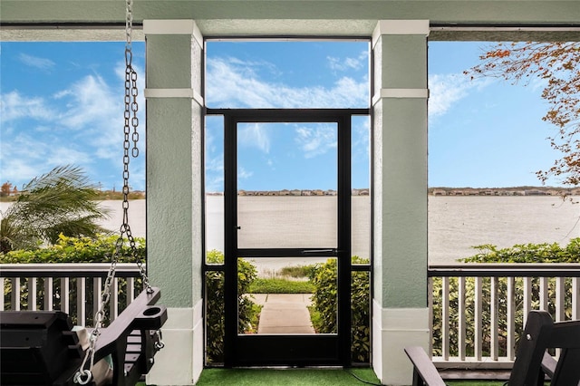 entryway featuring a water view