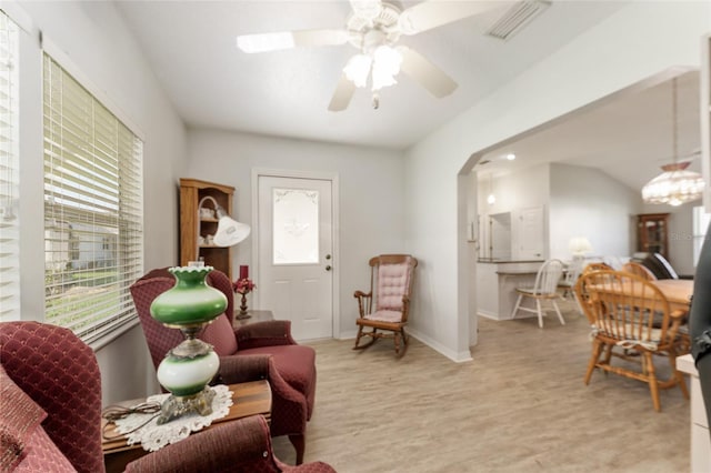 1904 De Hoyos Pl, The Villages, FL 32159 - sitting room with light wood-style floors, ceiling fan, visible vents, and plenty of natural light