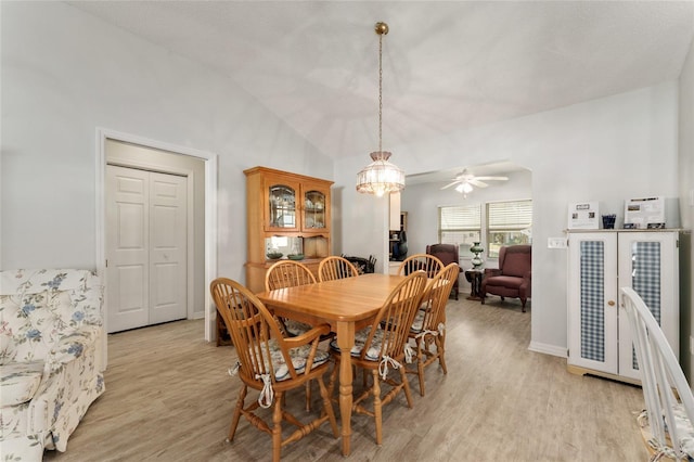 1904 De Hoyos Pl, The Villages, FL 32159 - dining room featuring lofted ceiling, light wood-style floors, baseboards, and ceiling fan