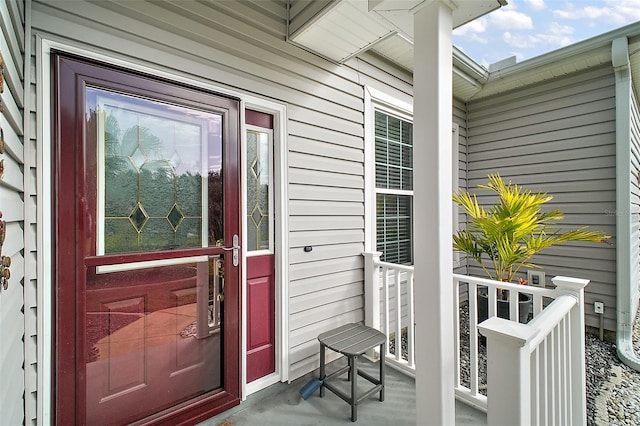 entrance to property with covered porch