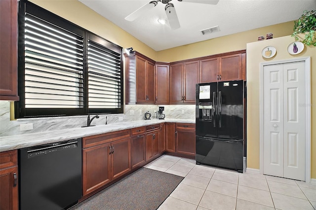 kitchen with black appliances, ceiling fan, decorative backsplash, light stone countertops, and light tile patterned floors