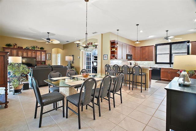 dining room featuring ceiling fan and light tile patterned floors