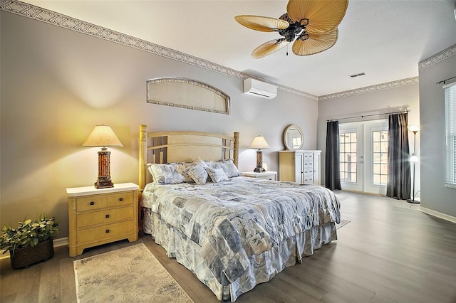 bedroom featuring access to exterior, french doors, a wall mounted AC, ceiling fan, and hardwood / wood-style floors