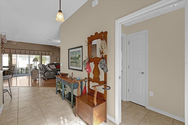 hallway featuring light tile patterned flooring