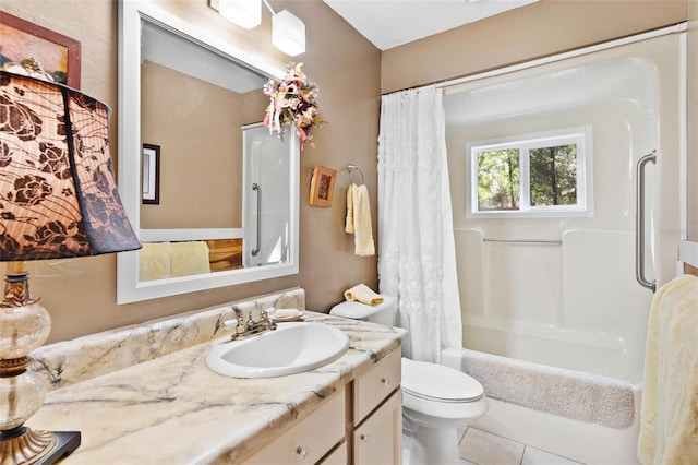 full bathroom featuring vanity, shower / bath combo, and toilet