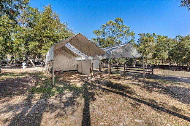 view of outdoor structure featuring a rural view