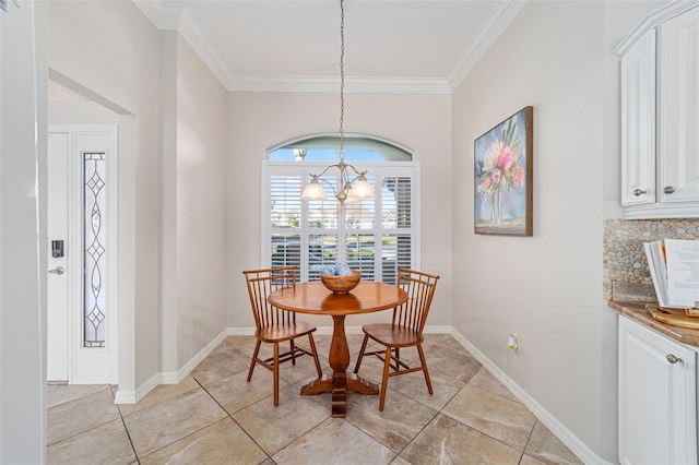 dining room with crown molding, light tile patterned floors, baseboards, and a notable chandelier