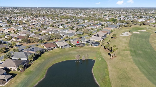 birds eye view of property with a residential view, a water view, and golf course view