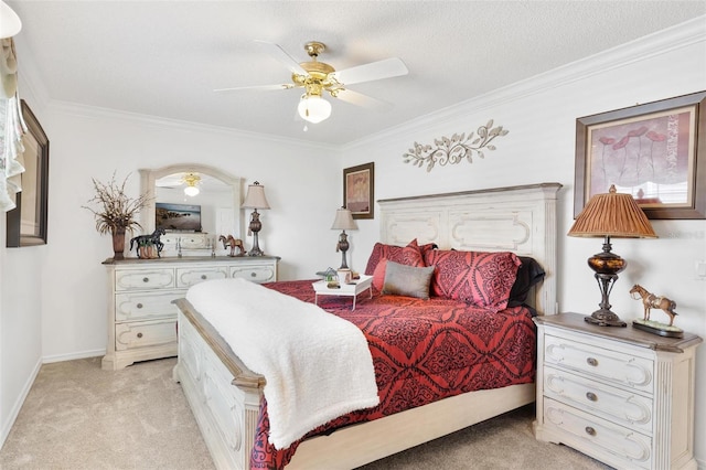 bedroom featuring ceiling fan, light colored carpet, a textured ceiling, and ornamental molding