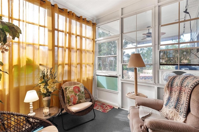 sunroom / solarium with ceiling fan